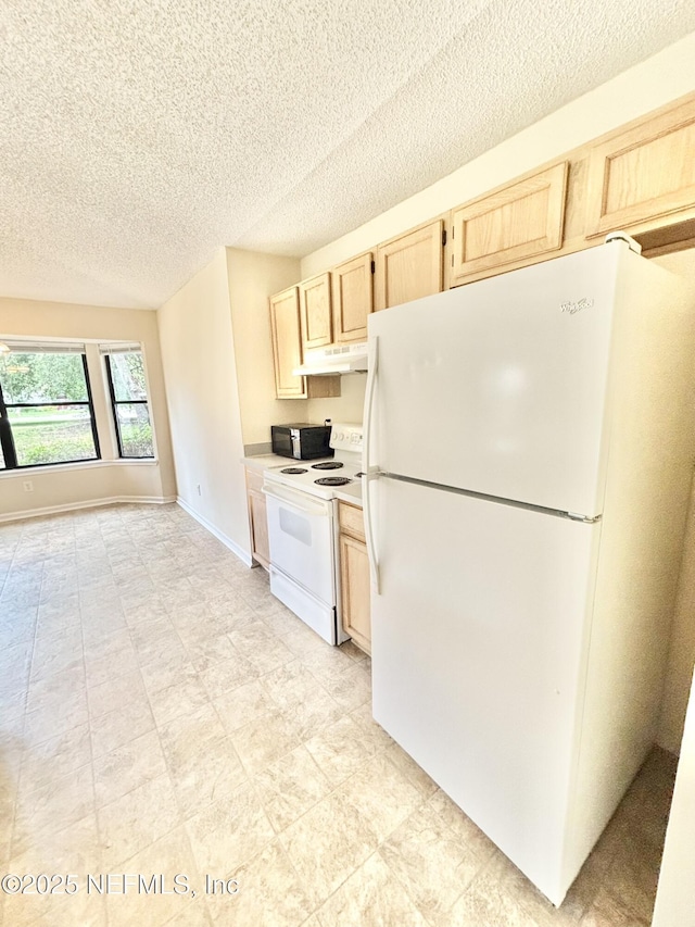 3951 Hunters Lake Cir W, Jacksonville, FL 32210 - kitchen with white appliances, light brown cabinets, under cabinet range hood, a textured ceiling, and light countertops
