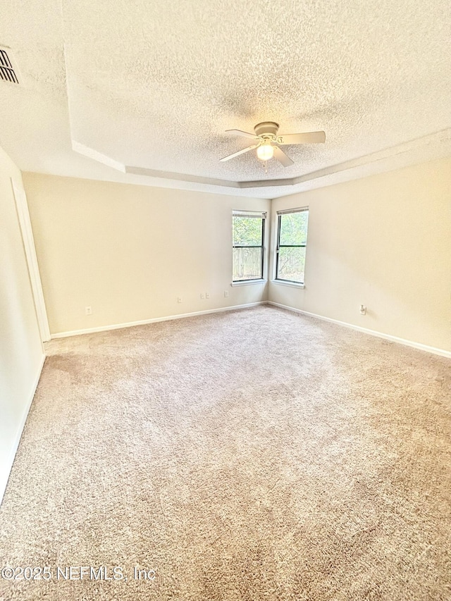 3951 Hunters Lake Cir W, Jacksonville, FL 32210 - unfurnished room featuring a textured ceiling, carpet flooring, ceiling fan, and baseboards