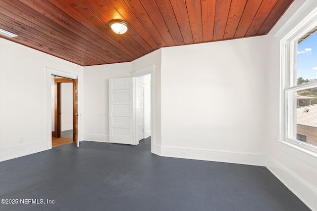 27 Grant St, Saint Augustine, FL 32084 - empty room featuring wood ceiling and baseboards