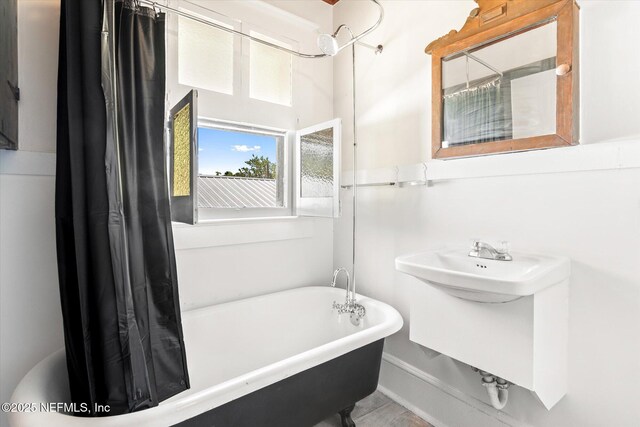 27 Grant St, Saint Augustine, FL 32084 - full bathroom with a soaking tub