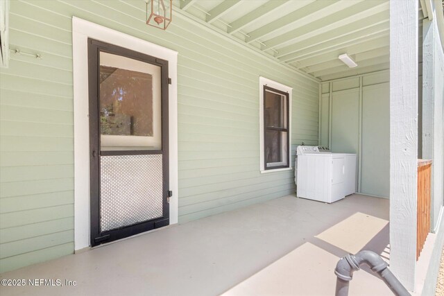 27 Grant St, Saint Augustine, FL 32084 - view of patio / terrace featuring separate washer and dryer