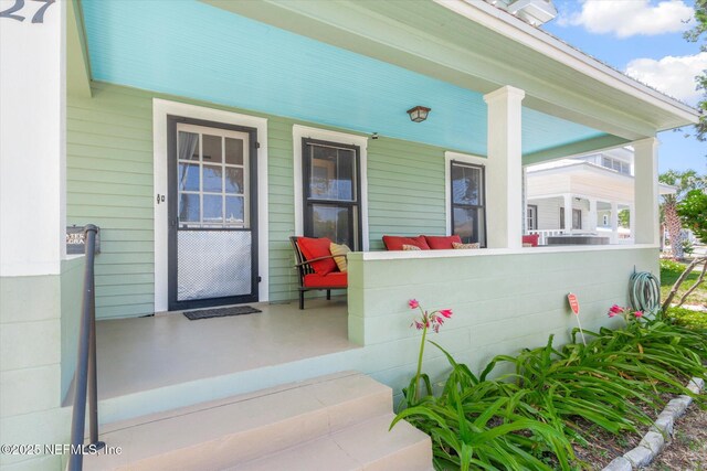 27 Grant St, Saint Augustine, FL 32084 - entrance to property featuring covered porch