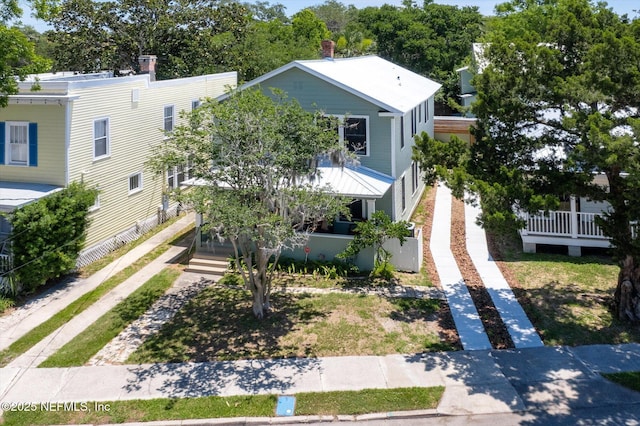 27 Grant St, Saint Augustine, FL 32084 - aerial view of property and surrounding area featuring a tree filled landscape