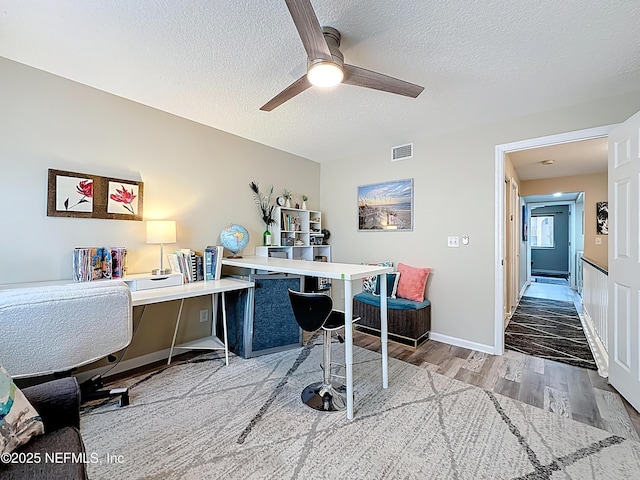 5375 Ortega Farms Blvd Unit 1011, Jacksonville, FL 32210 - office space featuring a textured ceiling, ceiling fan, and wood finished floors