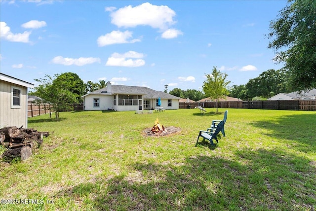 3910 Selig Ct, Middleburg, FL 32068 - view of yard with a fire pit