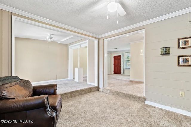 1133 Gunka Rd, Jacksonville, FL 32216 - carpeted living room featuring ceiling fan, ornamental molding, and a textured ceiling