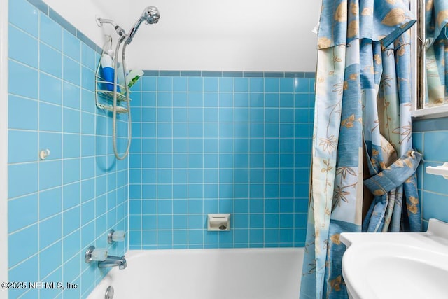 1133 Gunka Rd, Jacksonville, FL 32216 - bathroom featuring shower / tub combo and a sink