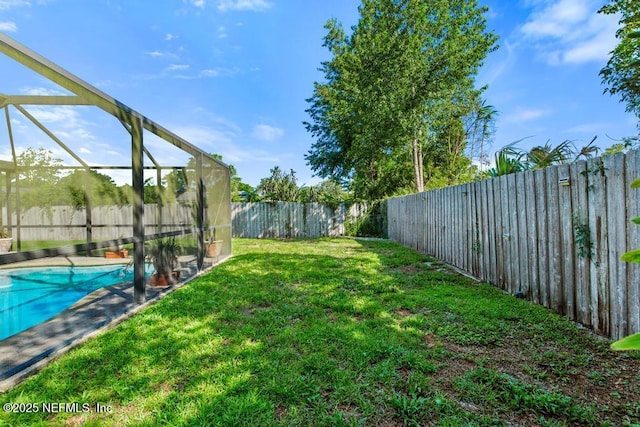 1133 Gunka Rd, Jacksonville, FL 32216 - view of yard with a lanai
