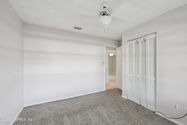 9620 Baylor Ave, Hastings, FL 32145 - unfurnished bedroom with carpet, a closet, a ceiling fan, and baseboards