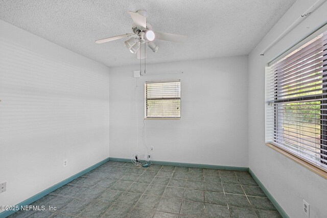 9620 Baylor Ave, Hastings, FL 32145 - carpeted empty room with ceiling fan, a textured ceiling, and baseboards