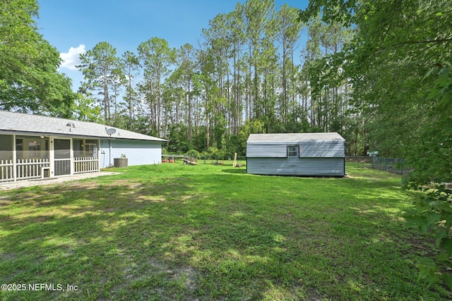9620 Baylor Ave, Hastings, FL 32145 - view of yard with a sunroom and view of wooded area