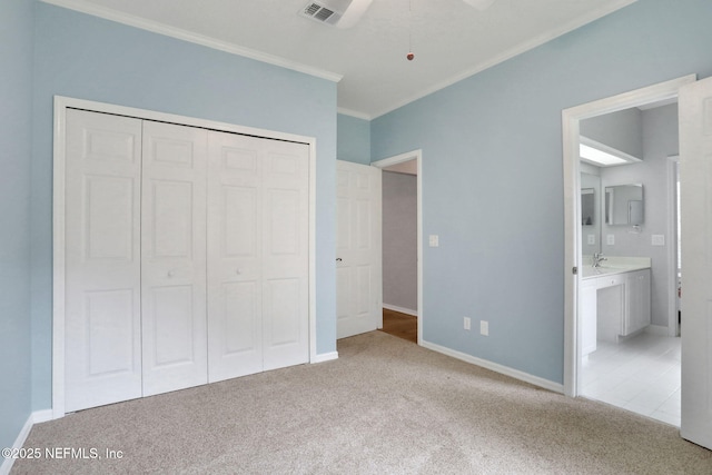 880 Buckeye Ln W, Saint Johns, FL 32259 - unfurnished bedroom featuring crown molding, a closet, carpet, ensuite bath, and a ceiling fan