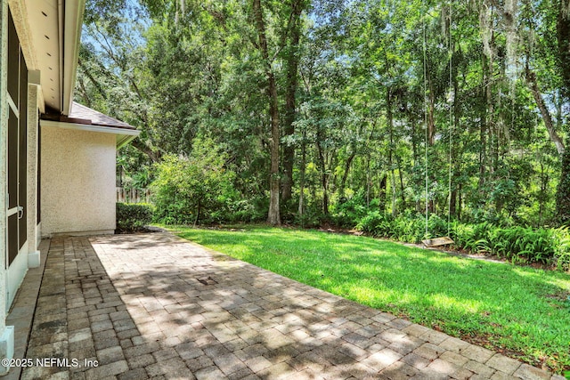 880 Buckeye Ln W, Saint Johns, FL 32259 - view of patio / terrace featuring a view of trees