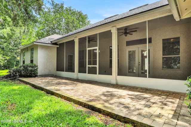880 Buckeye Ln W, Saint Johns, FL 32259 - rear view of house with a patio area, ceiling fan, french doors, a sunroom, and stucco siding