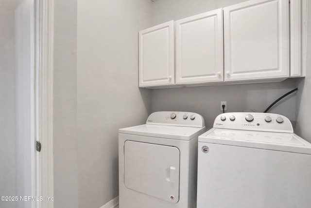 880 Buckeye Ln W, Saint Johns, FL 32259 - laundry room with cabinet space and washing machine and clothes dryer