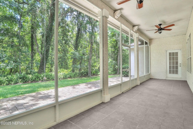 880 Buckeye Ln W, Saint Johns, FL 32259 - unfurnished sunroom featuring a ceiling fan