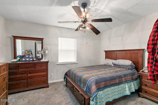 3020 Gilmore St, Jacksonville, FL 32205 - bedroom featuring carpet, a textured ceiling, and a ceiling fan