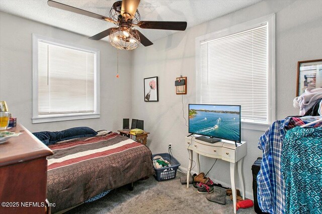 3020 Gilmore St, Jacksonville, FL 32205 - bedroom featuring carpet, ceiling fan, and multiple windows