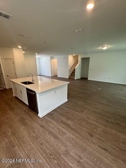 193 Silver Heron Way, Saint Augustine, FL 32092 - kitchen with a sink, dishwasher, dark wood finished floors, open floor plan, and a kitchen island with sink
