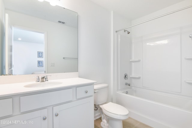 3369 Golden Eye Dr, Orange Park, FL 32065 - bathroom featuring vanity, toilet, tile patterned floors, and shower / washtub combination