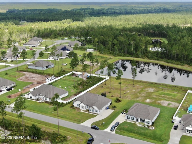 36461 Shortleaf Ave, Hilliard, FL 32046 - aerial view of residential area with a forest and a nearby body of water