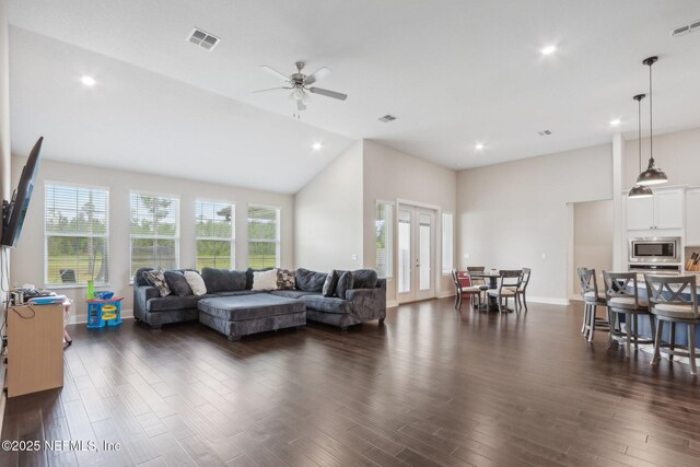 36461 Shortleaf Ave, Hilliard, FL 32046 - living room with high vaulted ceiling, ceiling fan, recessed lighting, dark wood-type flooring, and french doors