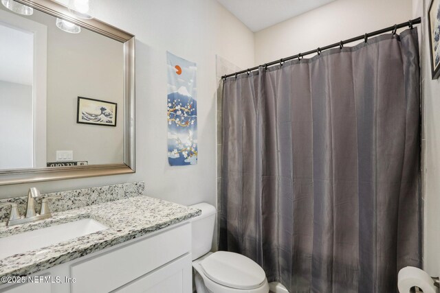 36461 Shortleaf Ave, Hilliard, FL 32046 - bathroom featuring toilet, vanity, and curtained shower