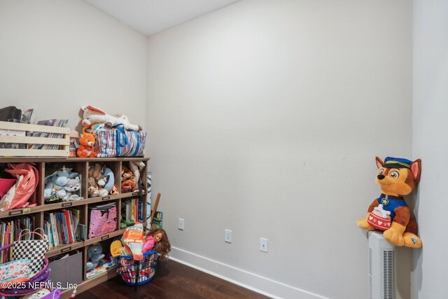 36461 Shortleaf Ave, Hilliard, FL 32046 - recreation room with baseboards and wood finished floors
