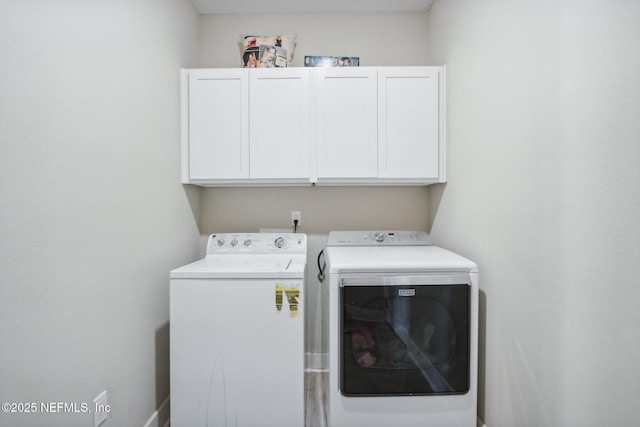 36461 Shortleaf Ave, Hilliard, FL 32046 - laundry room featuring separate washer and dryer and cabinet space