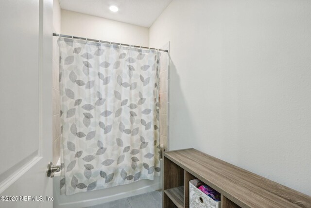 36461 Shortleaf Ave, Hilliard, FL 32046 - bathroom with shower / tub combo with curtain