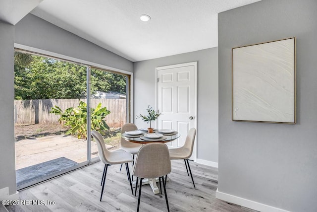 6903 Mayapple Rd, Jacksonville, FL 32211 - dining room with wood finished floors and recessed lighting