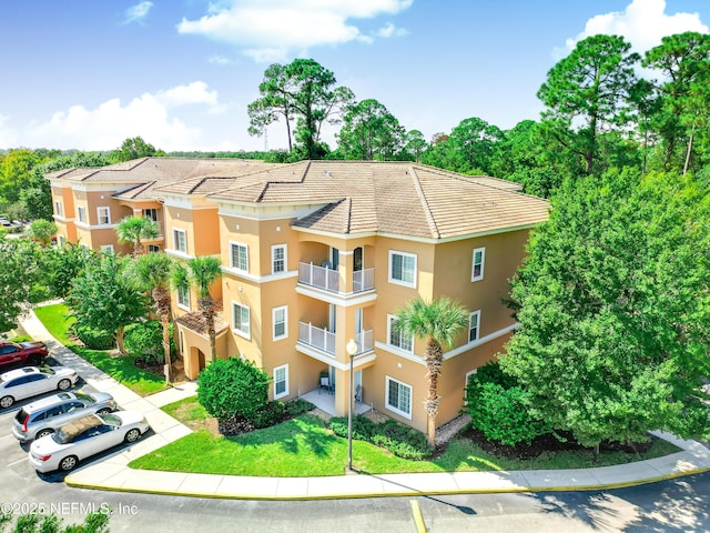 535 Florida Club Blvd Unit 307, Saint Augustine, FL 32084 - view of property featuring uncovered parking