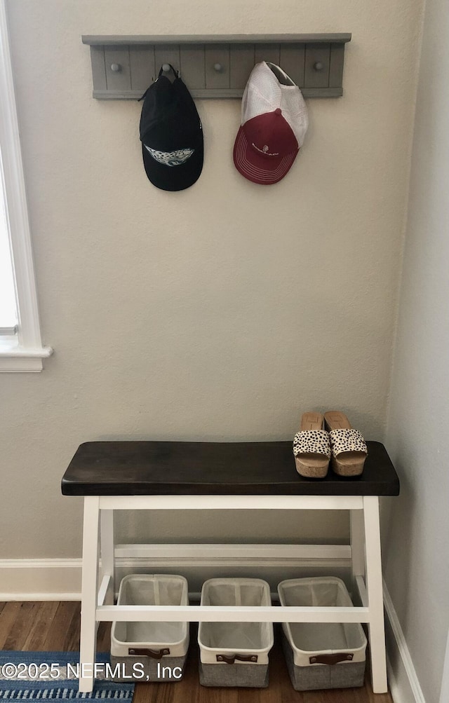 319 1st Ave N Unit 1-B, Jacksonville Beach, FL 32250 - detailed view of wood finished floors and baseboards
