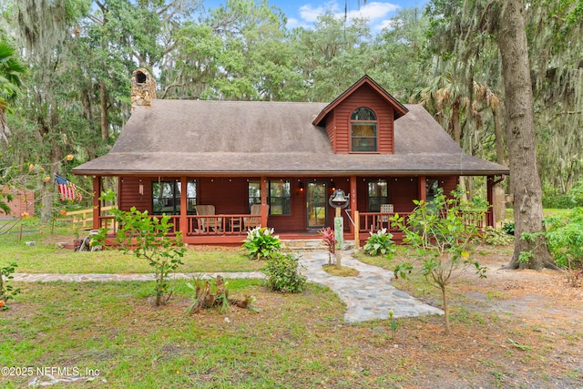 156 County Road 13, Saint Augustine, FL 32092 - view of front of house featuring a chimney and a porch