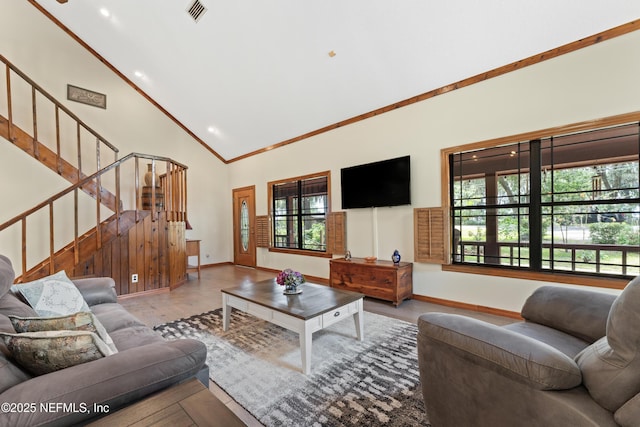 156 County Road 13, Saint Augustine, FL 32092 - living area with baseboards, plenty of natural light, stairway, high vaulted ceiling, and wood finished floors