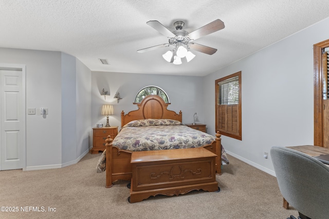 156 County Road 13, Saint Augustine, FL 32092 - bedroom featuring a textured ceiling, light colored carpet, baseboards, and a ceiling fan