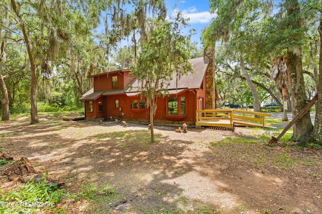 156 County Road 13, Saint Augustine, FL 32092 - view of property exterior featuring a deck and a chimney