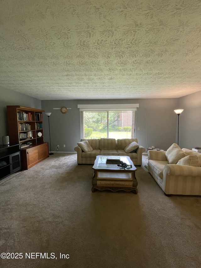 4915 Baymeadows Rd Unit 11E, Jacksonville, FL 32217 - carpeted living area featuring a textured ceiling