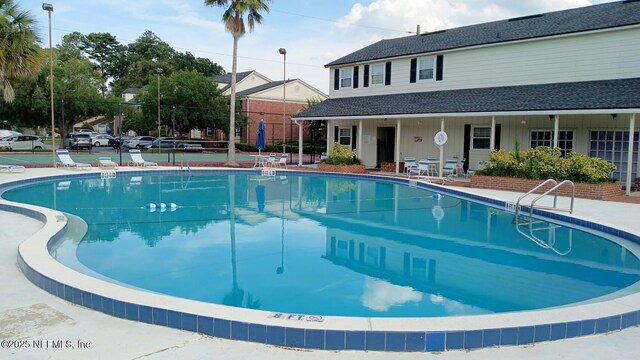 4915 Baymeadows Rd Unit 11E, Jacksonville, FL 32217 - community pool with a patio