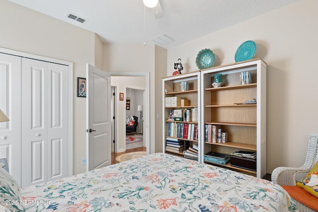 85464 Amaryllis Ct, Fernandina Beach, FL 32034 - bedroom with a closet and a ceiling fan