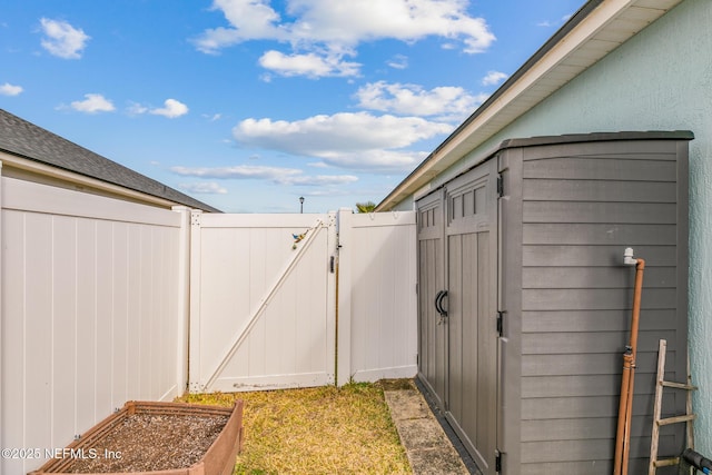 85464 Amaryllis Ct, Fernandina Beach, FL 32034 - view of yard featuring a gate and a vegetable garden