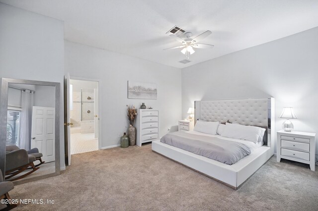 828 Lotus Ln N, Saint Johns, FL 32259 - carpeted bedroom with ensuite bathroom, ceiling fan, and baseboards