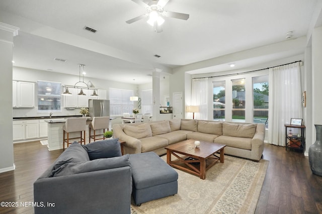 828 Lotus Ln N, Saint Johns, FL 32259 - living area featuring dark wood finished floors and ceiling fan