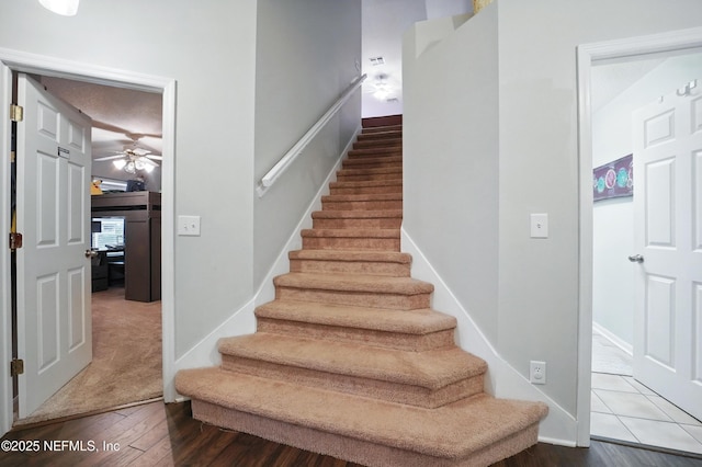 828 Lotus Ln N, Saint Johns, FL 32259 - staircase featuring ceiling fan, wood finished floors, and baseboards