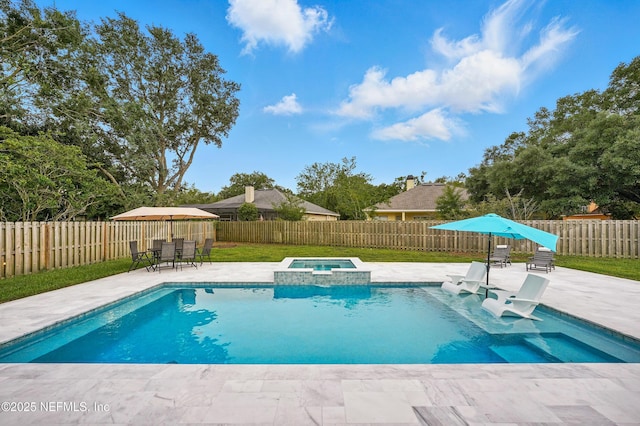 828 Lotus Ln N, Saint Johns, FL 32259 - view of swimming pool featuring a patio area, outdoor dining area, and a pool with connected hot tub