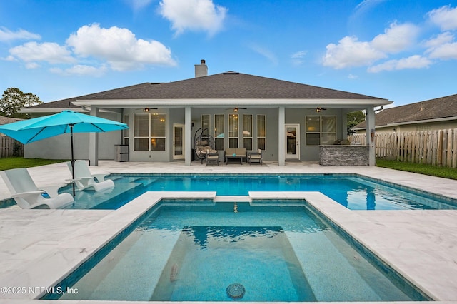 828 Lotus Ln N, Saint Johns, FL 32259 - view of swimming pool with a ceiling fan, a patio, an outdoor hangout area, and a pool with connected hot tub