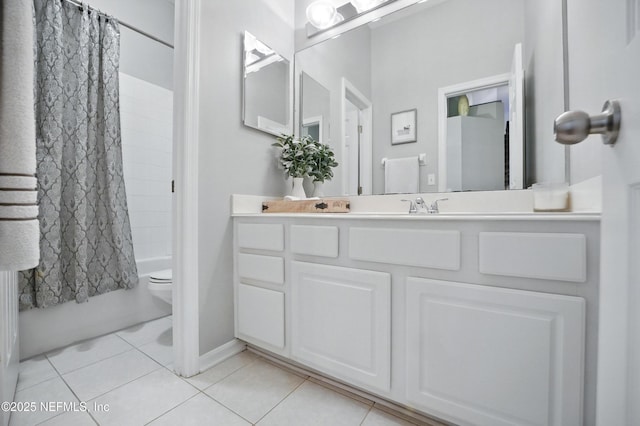 828 Lotus Ln N, Saint Johns, FL 32259 - bathroom featuring tile patterned flooring, toilet, vanity, and shower / bathtub combination with curtain