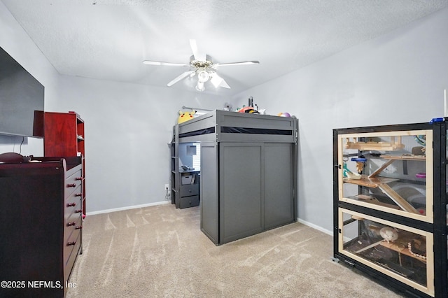 828 Lotus Ln N, Saint Johns, FL 32259 - bedroom featuring carpet floors, a textured ceiling, baseboards, and a ceiling fan