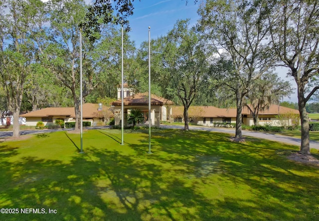 828 Lotus Ln N, Saint Johns, FL 32259 - view of community featuring a lawn