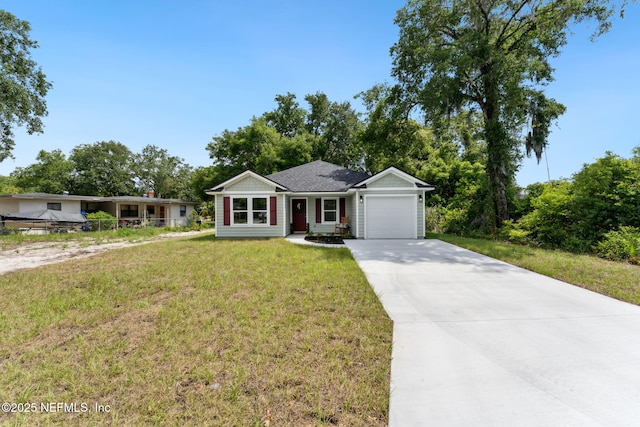 127 Azalea Cir, Palatka, FL 32177 - ranch-style house with concrete driveway, an attached garage, and a front lawn